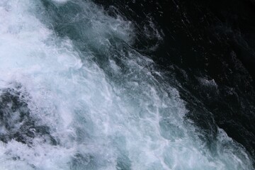 Fototapeta premium water flowing from a waterfall