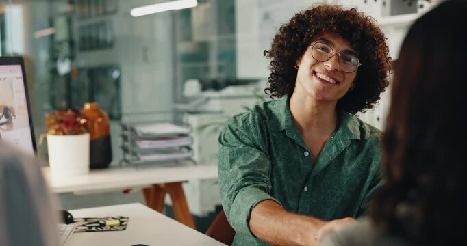 Creative, man and client in office with handshake for interview, onboarding or deal opportunity. Agreement, design and business people shaking hands with smile, introduction and b2b at digital agency