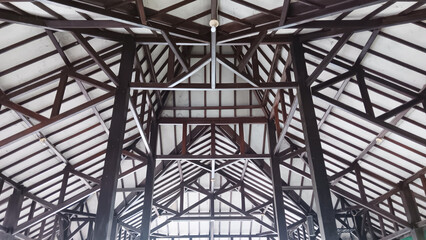 Abstract pattern of wooden roof construction