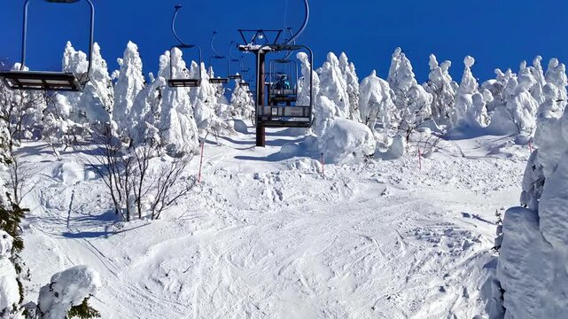 View from a chairlift passing through a forest of ice monsters (Zao, Yamagata, Japan)