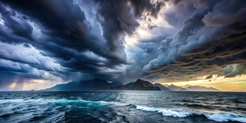 Obraz premium Stormy skies creating an ominous atmosphere over a turbulent mountainous sea, stormy, skies, rough, mountainous, sea, clouds
