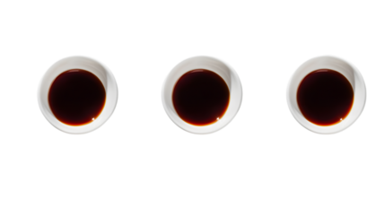 Top and side view bundle of rich dark soy sauce served in white bowls, isolated on a white background perfect for Asian cuisine, seasoning, and food visuals.