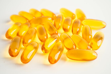 Fish oil or Cod liver oil gel in capsules with omega 3 vitamins, supplementary healthy food.