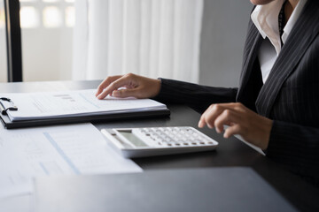 business man Auditor or internal revenue service staff checking annual financial statements company Audit  Accounting tax