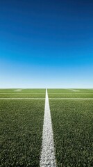 Obraz premium A clear view of a sports field with a blue sky above.