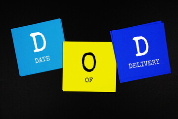 DOD - Date Of Delivery acronym text on sticky note on black background