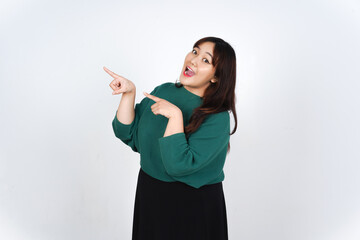 Smiling Presenting and Pointing aside at copy space for Advertising showing Product Of Beautiful Asian Woman Isolated On White Background
