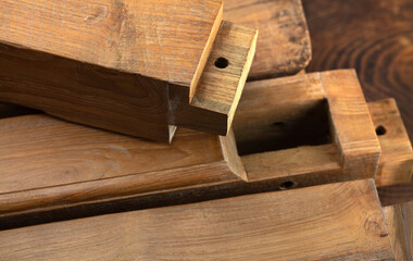 Mortise, tenon joints of antique rustic furniture. VIntage teak furniture.
