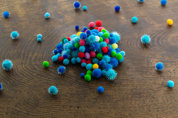 Universe of Blue and color full yarn fuzz balls like particles.