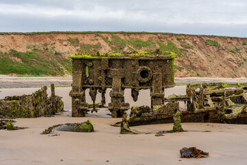 Stones on the beach and the ST Pasages Shipwreck between Ballasalla and Sartfield, Isle of Man
