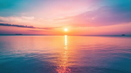 Obraz premium A serene sunset over calm waters, creating a tranquil atmosphere.