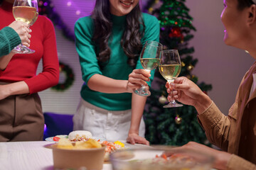 At New Year's Eve and Christmas Eve parties, Asian friends and coworkers come to celebrate together. Champagne, wine, popcorn, gift boxes, and festive decorations create a fun holiday atmosphere.