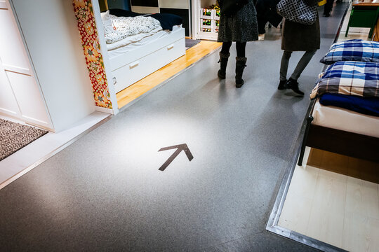 Interior of large IKEA store with a wide range of products in Malmo, Sweden. Direction instructions. Ikea was founded in Sweden in 1943, Ikea is the world's largest furniture retailer.