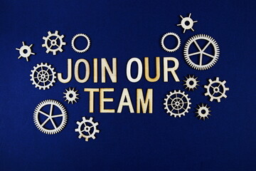 Join Our Team alphabet letters with gears element on navy blue background