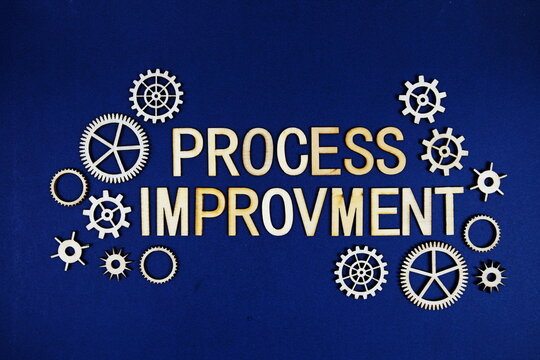 Process Improvment alphabet letters with gears element on navy blue background