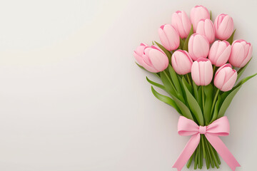 Obraz premium a bouquet of pink tulips tied with a satin ribbon on a white background. Women's Day on March 8th concept.