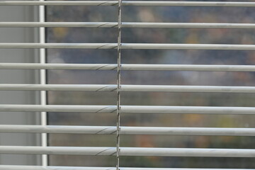 white blinds curtain on window in modern house