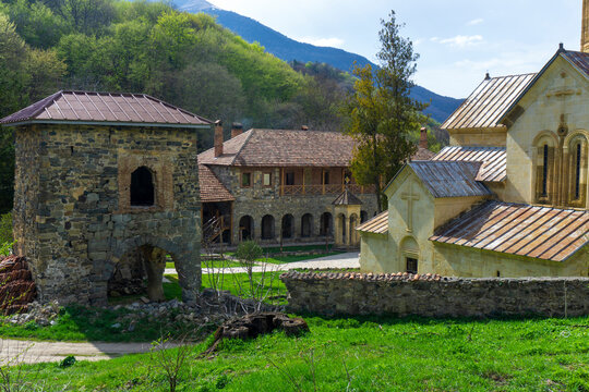 The courtyard of the Kvatakhevi monastery. Stone walls, a tower, part of the church, living quarters of the monks.