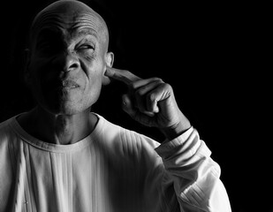suffering from deafness and hearing loss on grey background with people stock image stock photo	
