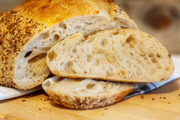 Homemade bread, sourdough wheat loaf with seeds