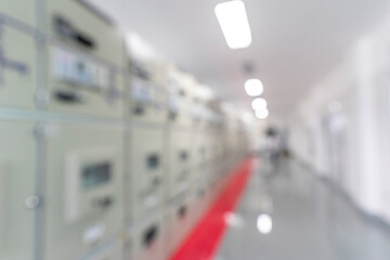Blur image of electrical switchgear room of Industrial electrical power plant.