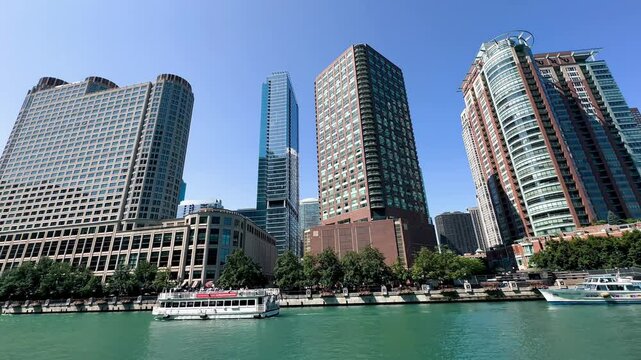 Chicago skyscrapers along Chicago River in summer time