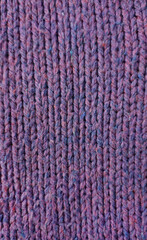 Fototapeta premium Wool fabric photographed close-up in a special design. Texture faded material. Clothing background sweater