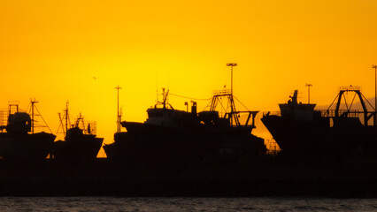 Fototapeta premium sunset over the port of the city of Essaouira, in Morocco