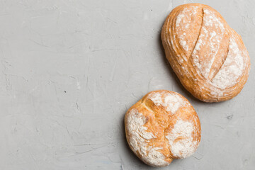 Homemade natural breads. Different kinds of fresh bread as background, top view with copy space