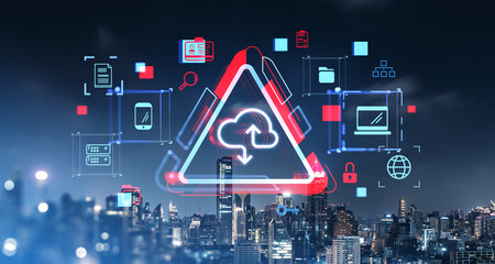 Cloud storage concept with icons over cityscape at night.