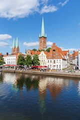 L&uuml;beck's old town with Trave river portrait format Hanseatic city of L&uuml;beck in Germany