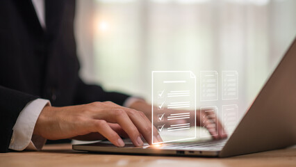 Accountant showing office document auditing concept ,plan review process and assess correctness ,Management of important document storage of organization ,document system ,accountant Audit documents.