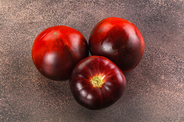 Black ripe juicy organic tomato