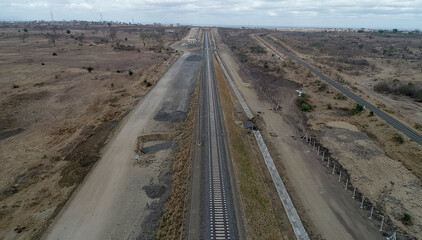 Railway Tracks Stretching Into the Horizon Across a Steppe
