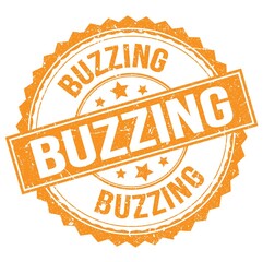 BUZZING text on orange round stamp sign