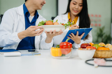 Nutritionists consulting on healthy food choices, meal planning, and wellness concepts