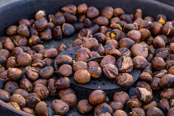 Roasted sweet chestnuts close up. Organic food. Food background. Healthy eating