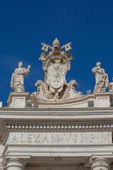 Papal coat of arms of the Holy See and Vatican City at St. Peter's Square, Vatican, Rome, Italy