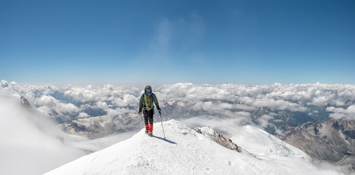Russia, Upper Baksan Valley, Caucasus, Mountaineer ascending Mount Elbrus
