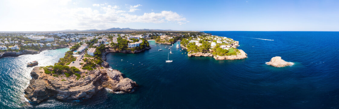 Spain, Mallorca, Portocolom, Aerial view of Cala d'Or and bay Cala Ferrera