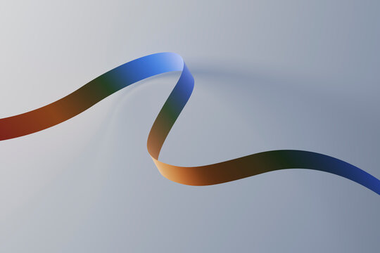 Multi colored ribbon against gray background