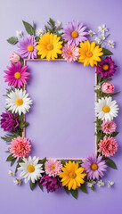 Obraz premium flower frame made of colorful blossoms on a light purple background with empty space in the center