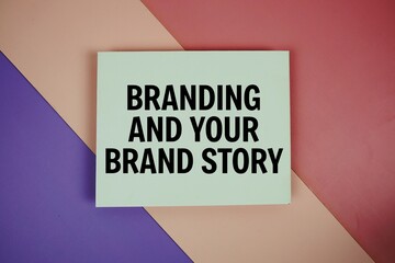 Branding And Your Brand Story text on paper card on purple and pink geometric background