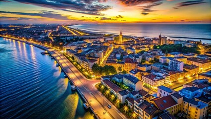 Fototapeta premium Rimini Night Aerial Photography: Stunning City Lights, Italian Coastline, Drone View