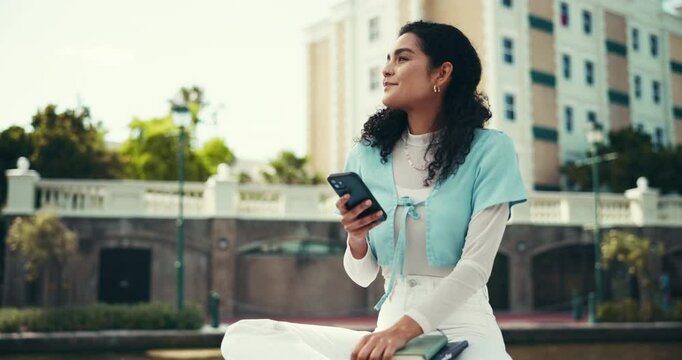 Woman, student and phone with thinking at college for reflection, mobile app and happy at campus. Girl, person and smartphone with smile, books or inspiration for learning at university in Costa Rica