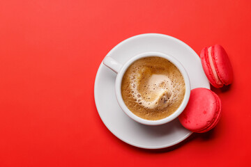 A cozy coffee cup paired with delightful macaroons