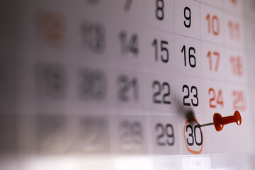 Close-Up of Calendar with Pin Marking the 30th Date, Time Management Concept, Planning and...