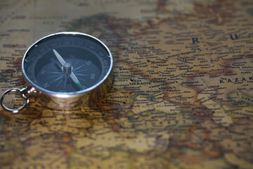 Vintage Compass on Antique World Map - Exploring Travel and Adventure