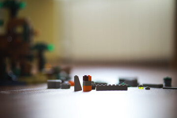 Children's Building Blocks Scattered on Floor in Soft Focus Background