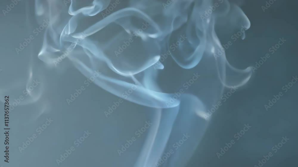 Poster beautiful wisps of smoke dance against a dark background, creating mesmerizing patterns in the air